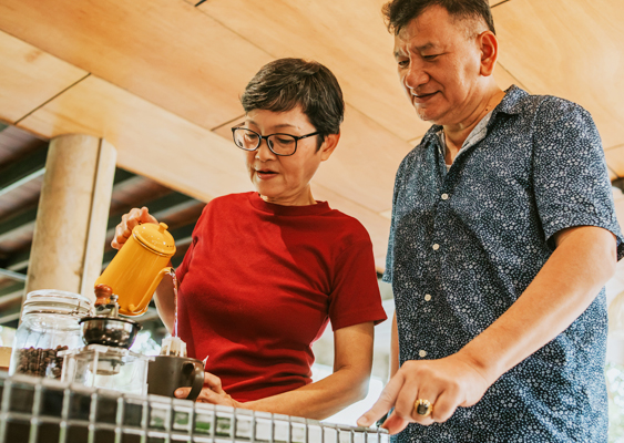 Couple working together in the kitchen.