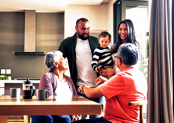 Multigenerational family at a dining table.